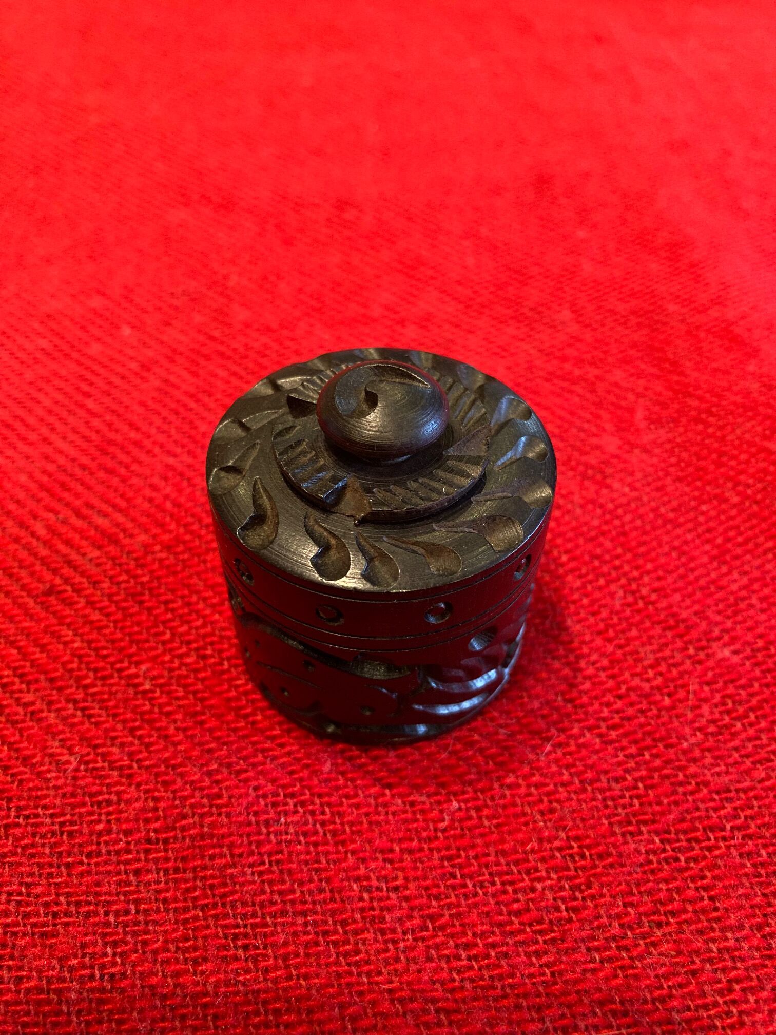 Old round box in carved ebony