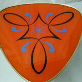 Plant holder tripod in geometrically patterned orange formica