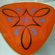 Plant holder tripod in geometrically patterned orange formica