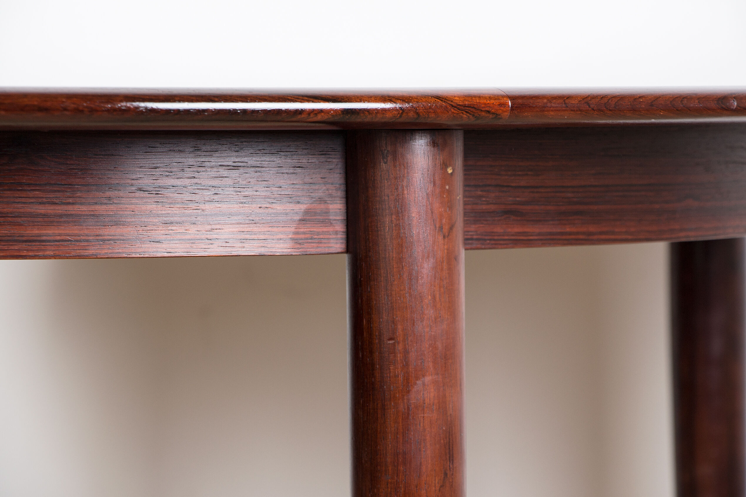 Danish extendable dining table in Rio Rosewood model 55 by Arne Vodder for Sibast 1958.