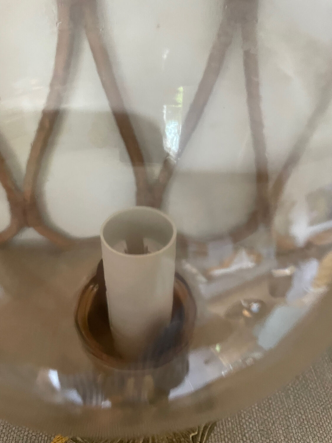2 bedside lamps with round amber glass globes and gold metal.