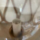 2 bedside lamps with round amber glass globes and gold metal.