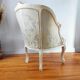 Fauteuil ancien bergère style Louis XV patiné