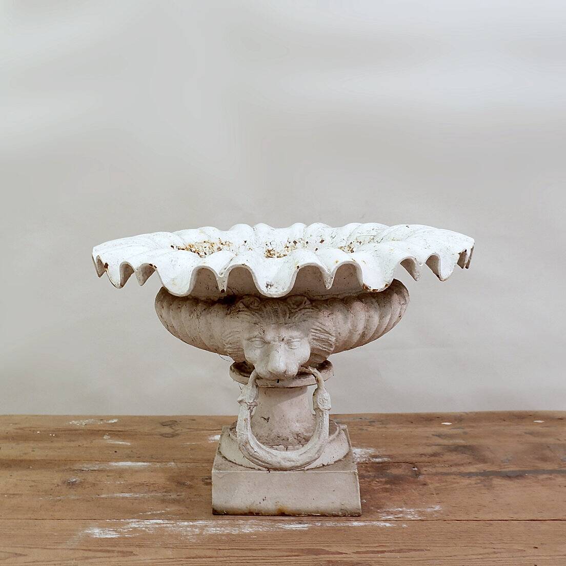 19th century cast iron basin, lion head handles