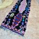 Vintage Berber Boucherouite hallway rug: Handwoven Moroccan rug.