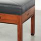Ottoman en cuir noir au design Art Déco