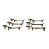 A delightful set of 6 French vintage cutlery remains in the shape of an elongated Dachshund Dog. Here