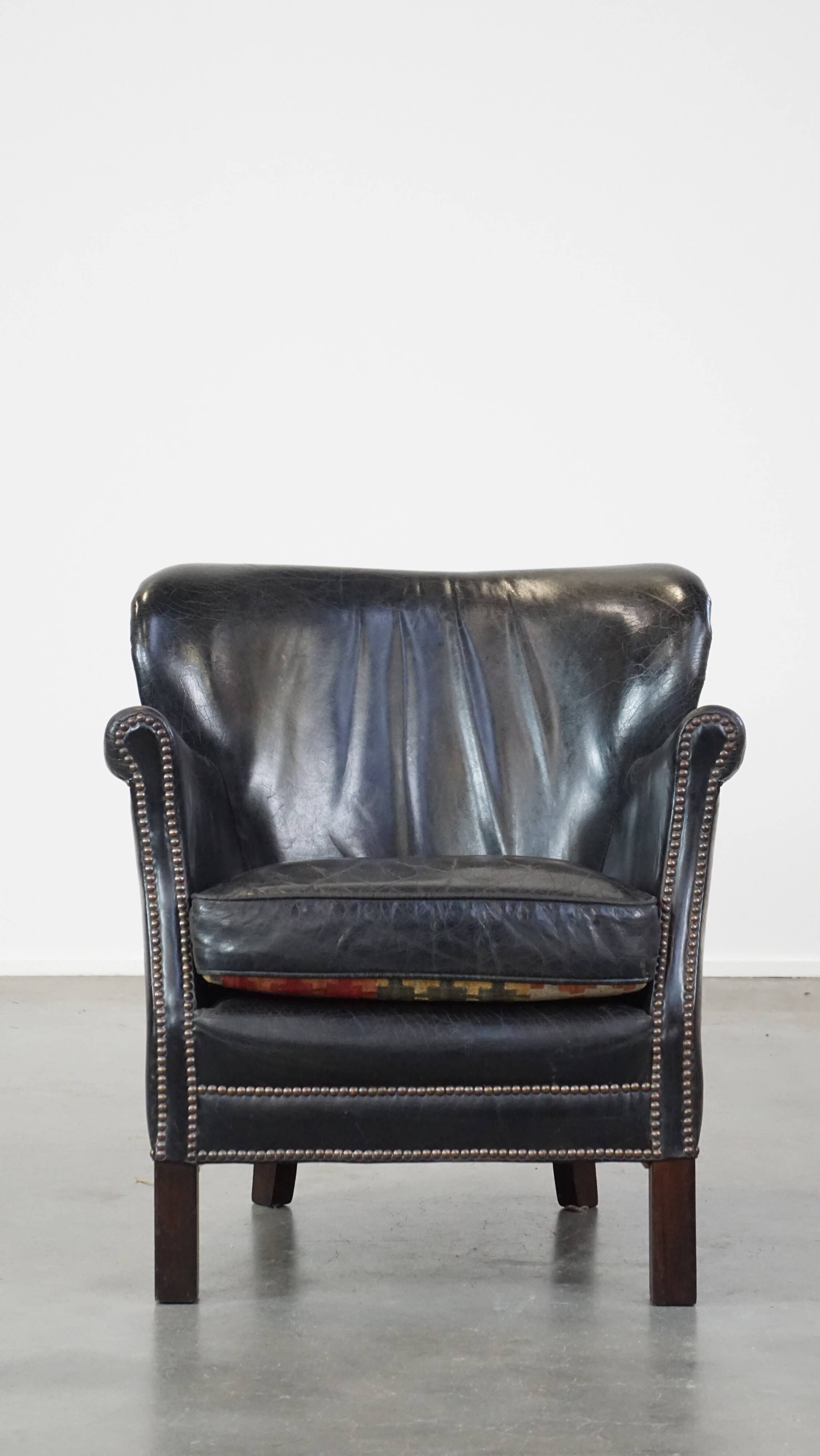 Fauteuil en cuir de vachette noir