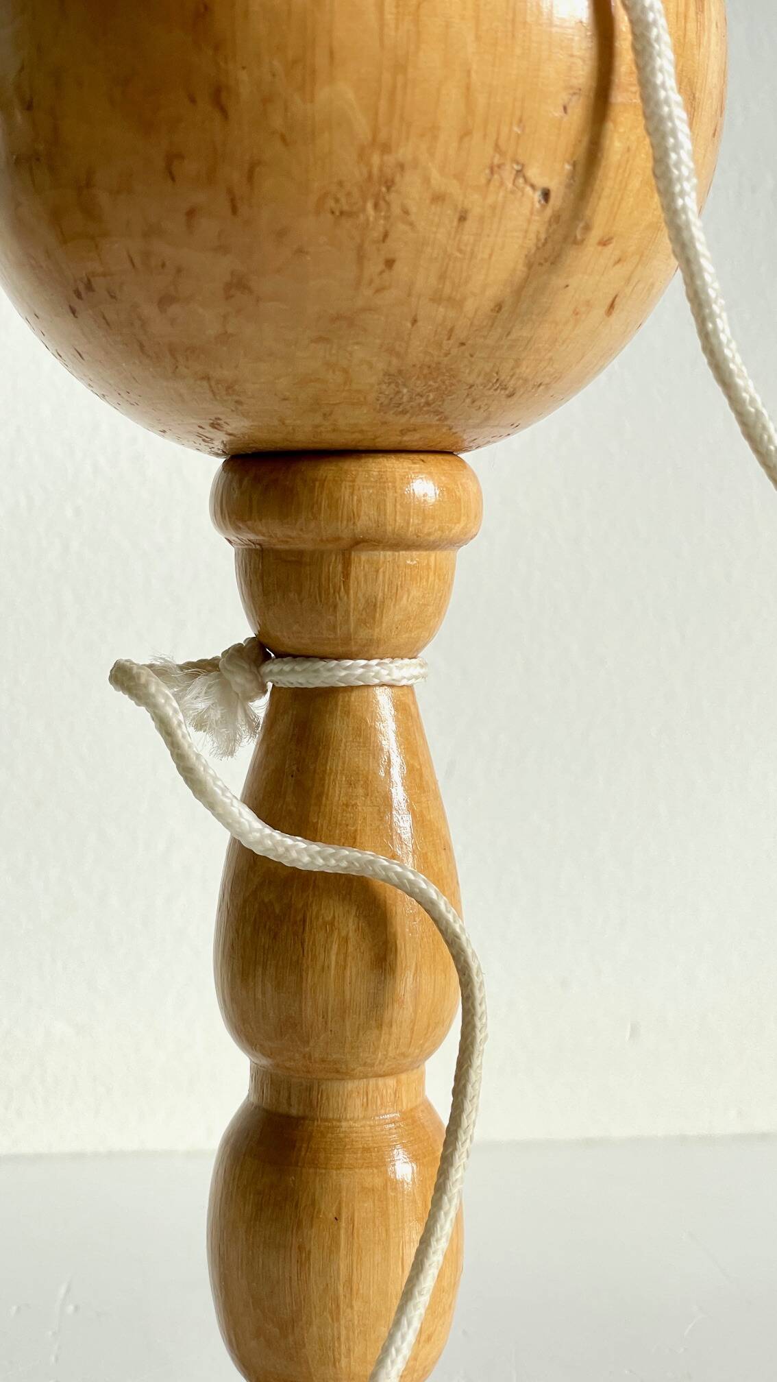 Vintage wooden cup-and-ball toy