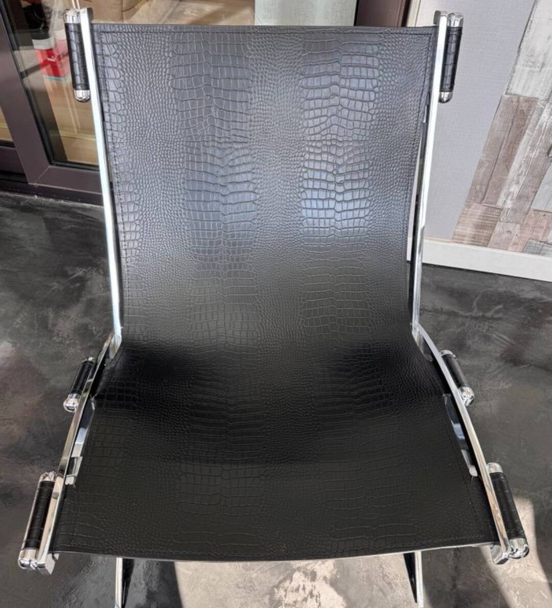 ILVA Cuba model armchair in black leather, Denmark, 2000s.