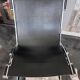 ILVA Cuba model armchair in black leather, Denmark, 2000s.