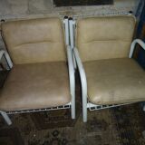 pair of iron armchairs