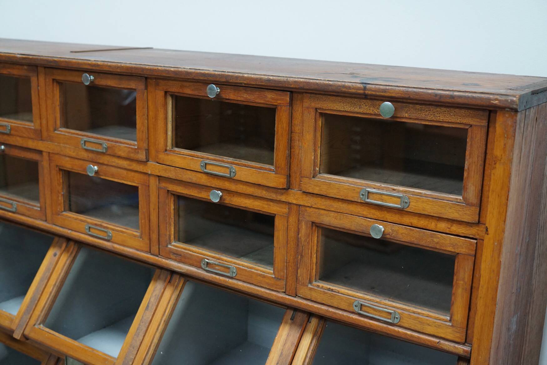 Very large Dutch oak showcase for grocery or haberdashery, 1920s-1930s