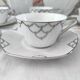Service à café Art Déco en porcelaine blanche décor argenté