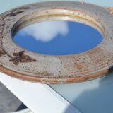 Round ceramic mirror signed
