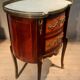 Veneered tambour door chest of drawers