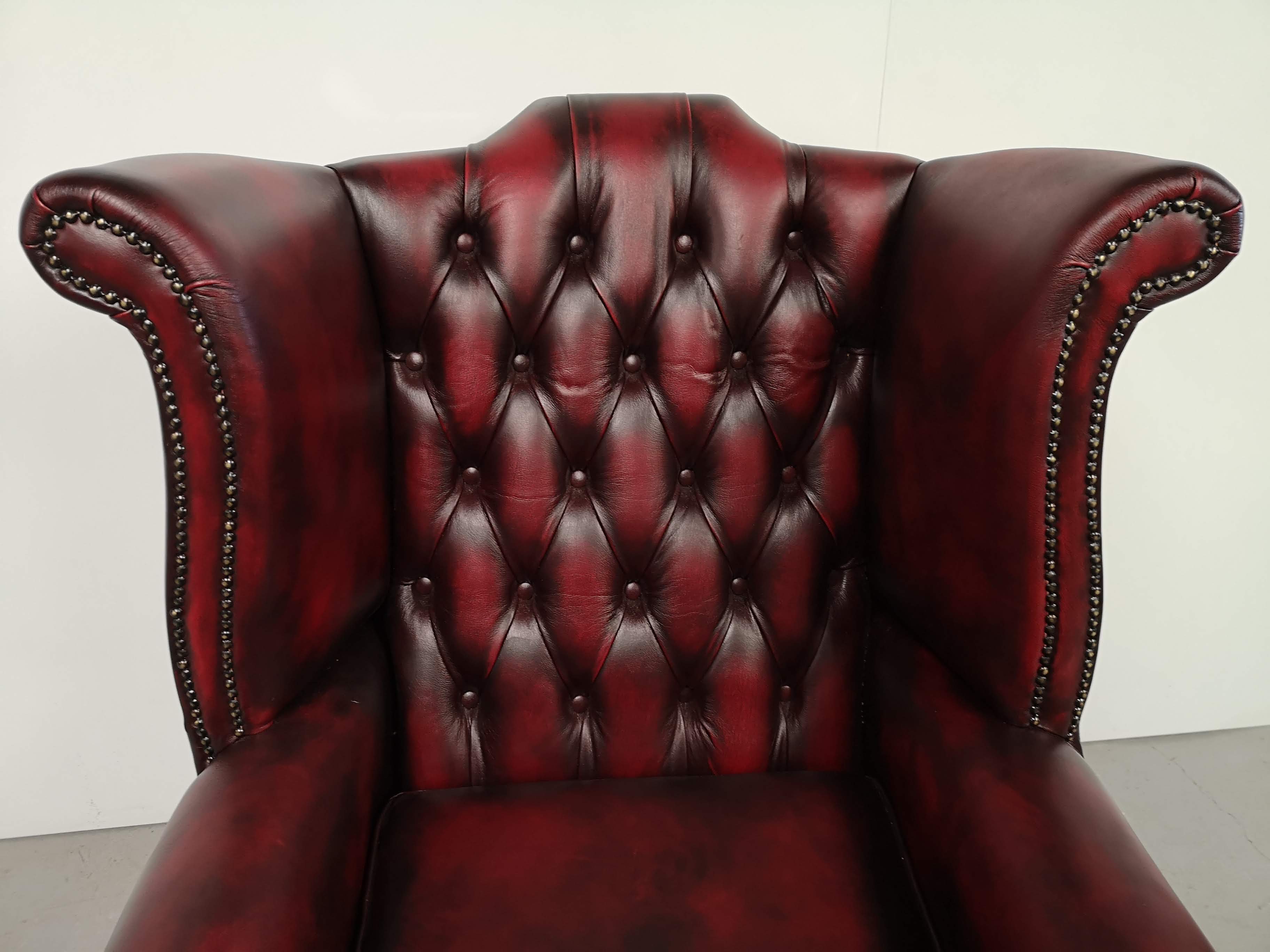 Burgundy chesterfield chair