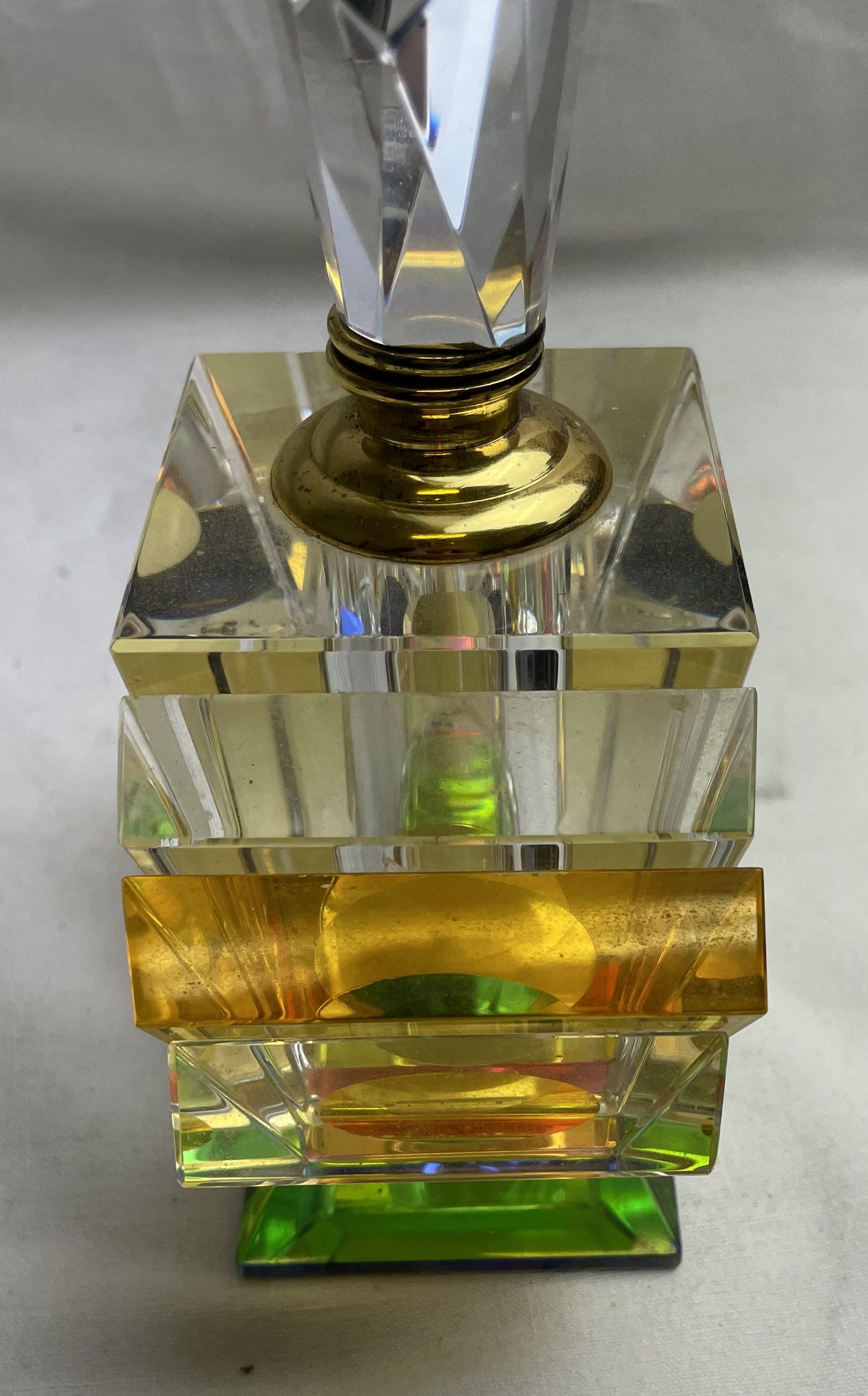 Empty art deco perfume bottle in amber crystal