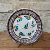 Old plate with brown border and flowers called black bottom