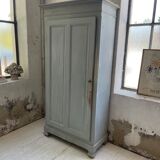 Blue patinated cap cabinet