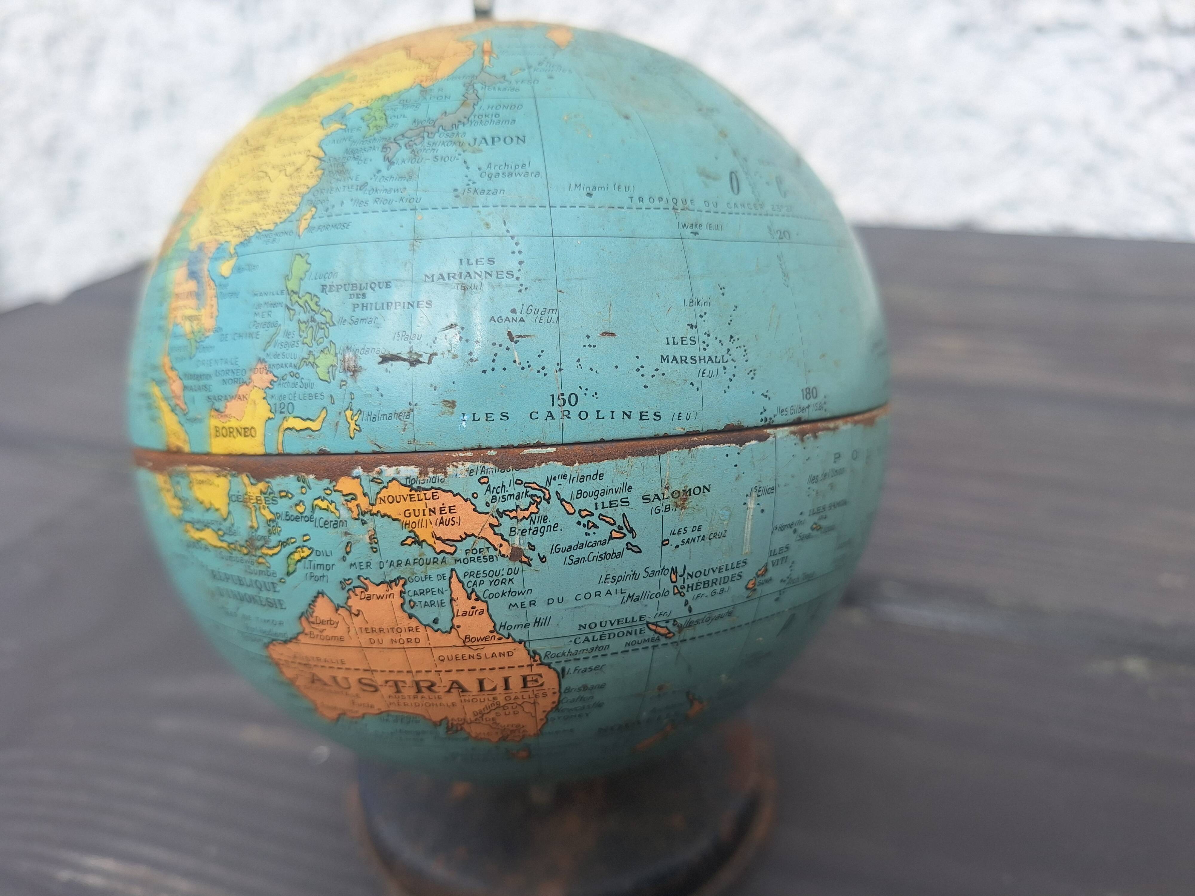 Old small metal globe "taride maps"