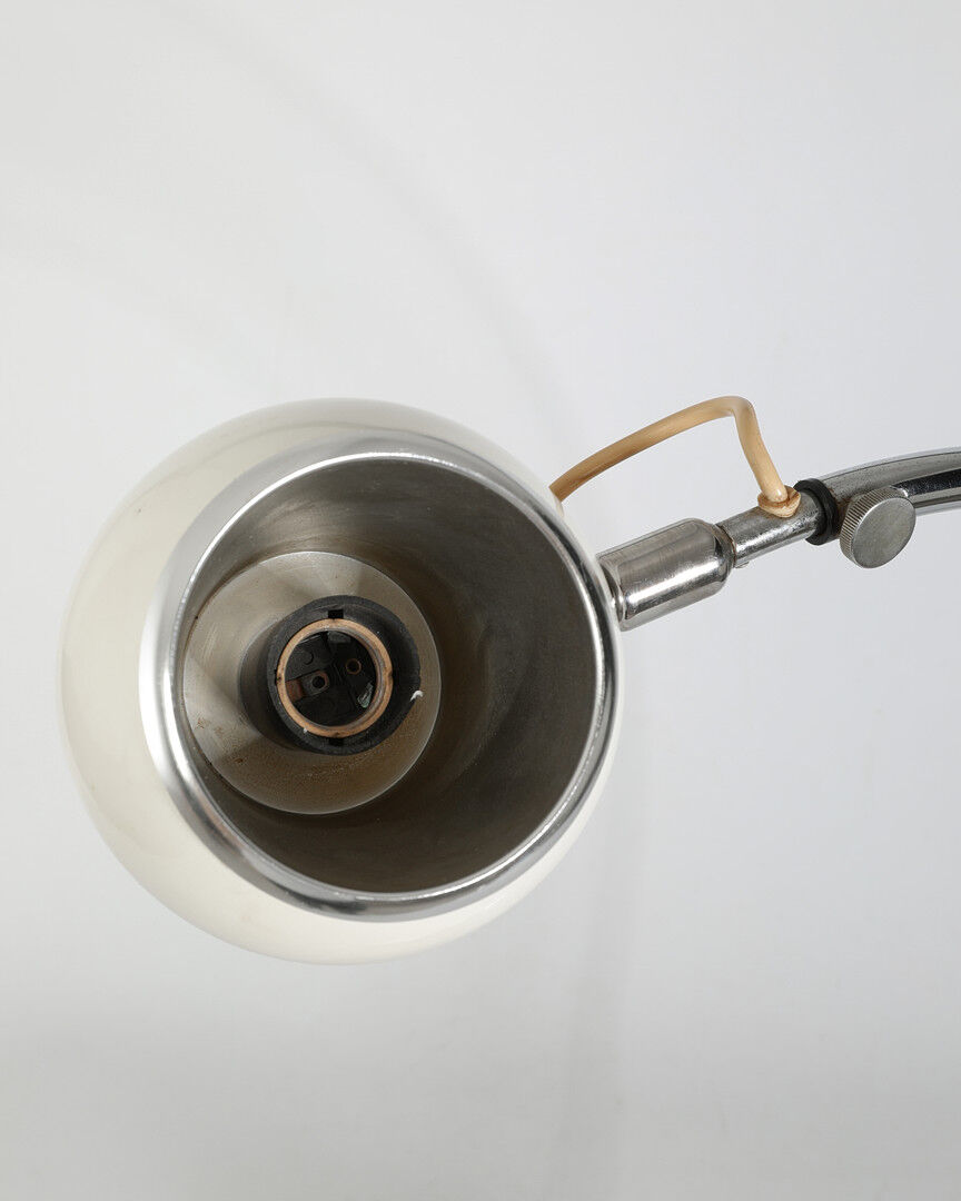 Lamp designed by luci cinisello - origin milan, italy - material: chromed metal painted white - height