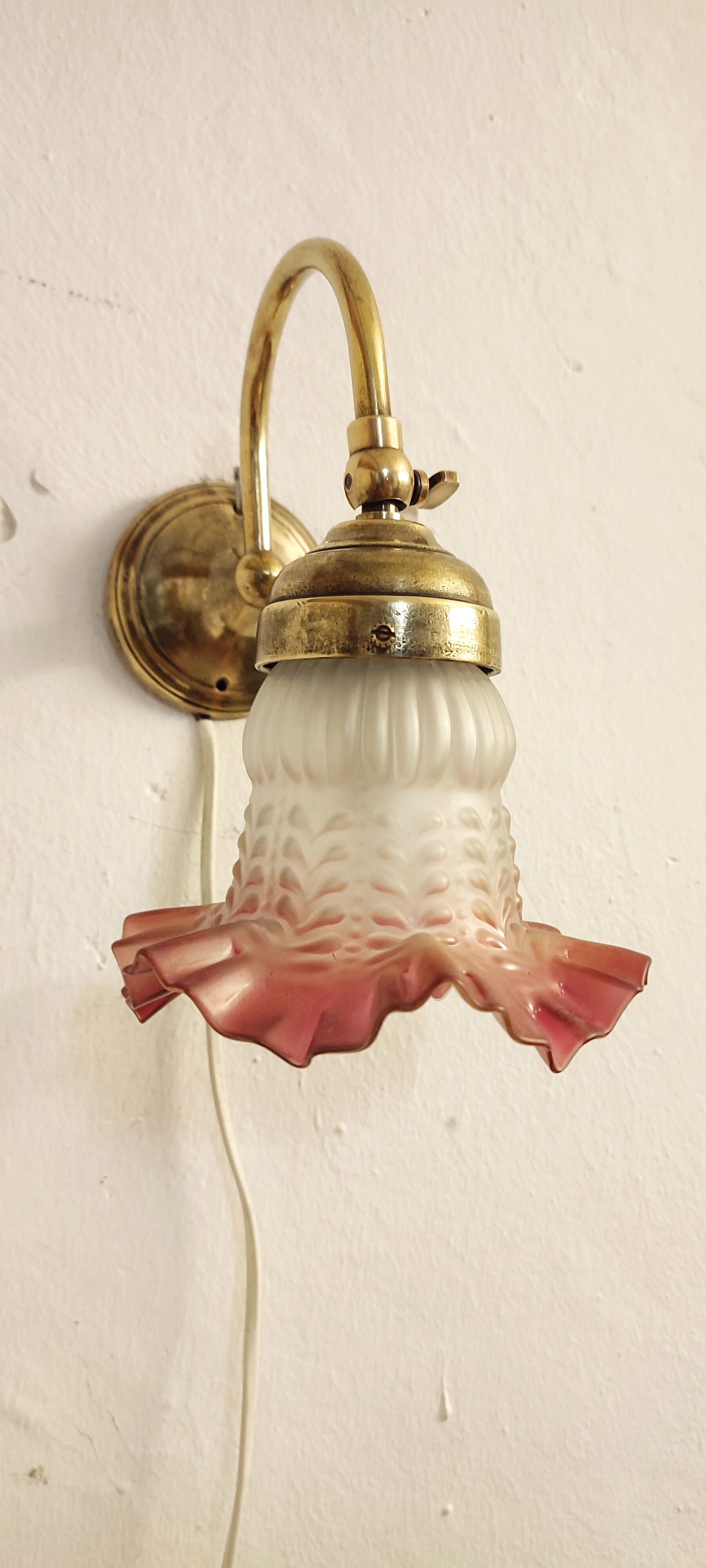 Bronze and glass wall lamp. Spain, 1940s.