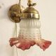 Bronze and glass wall lamp. Spain, 1940s.