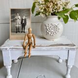 Small ceramic vase with floral relief