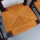 Set of 4 vintage brutalist chairs by Georges Robert in wood and straw.