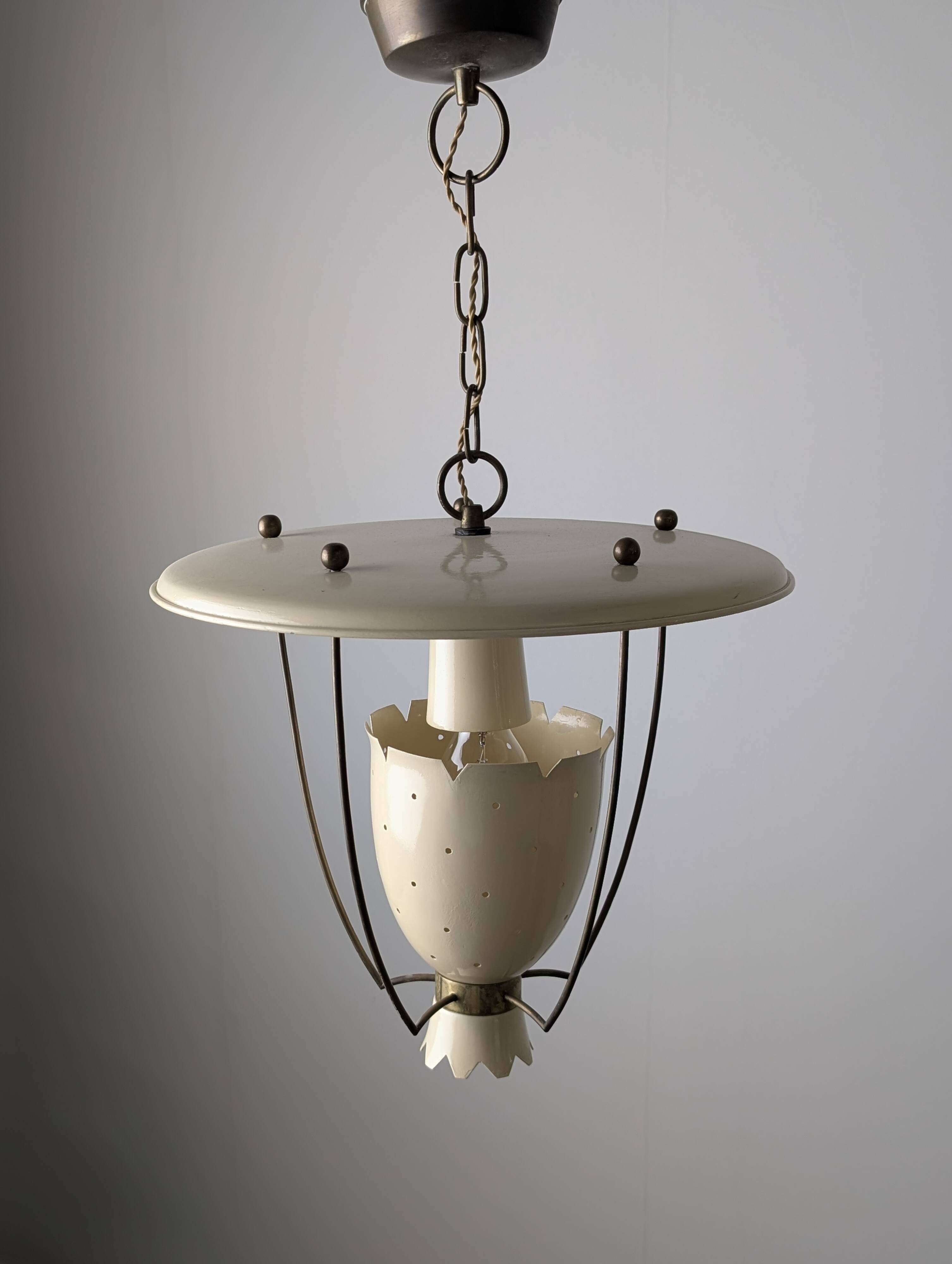 Perforated metal pendant lamp with brass details, Italy, 1940s