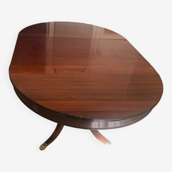 Round mahogany dining table