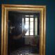 Mirror Empire, early nineteenth, gilded with leaf, h 56 cm