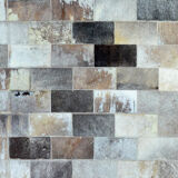 Leather carpets with rectangular geometric patterns