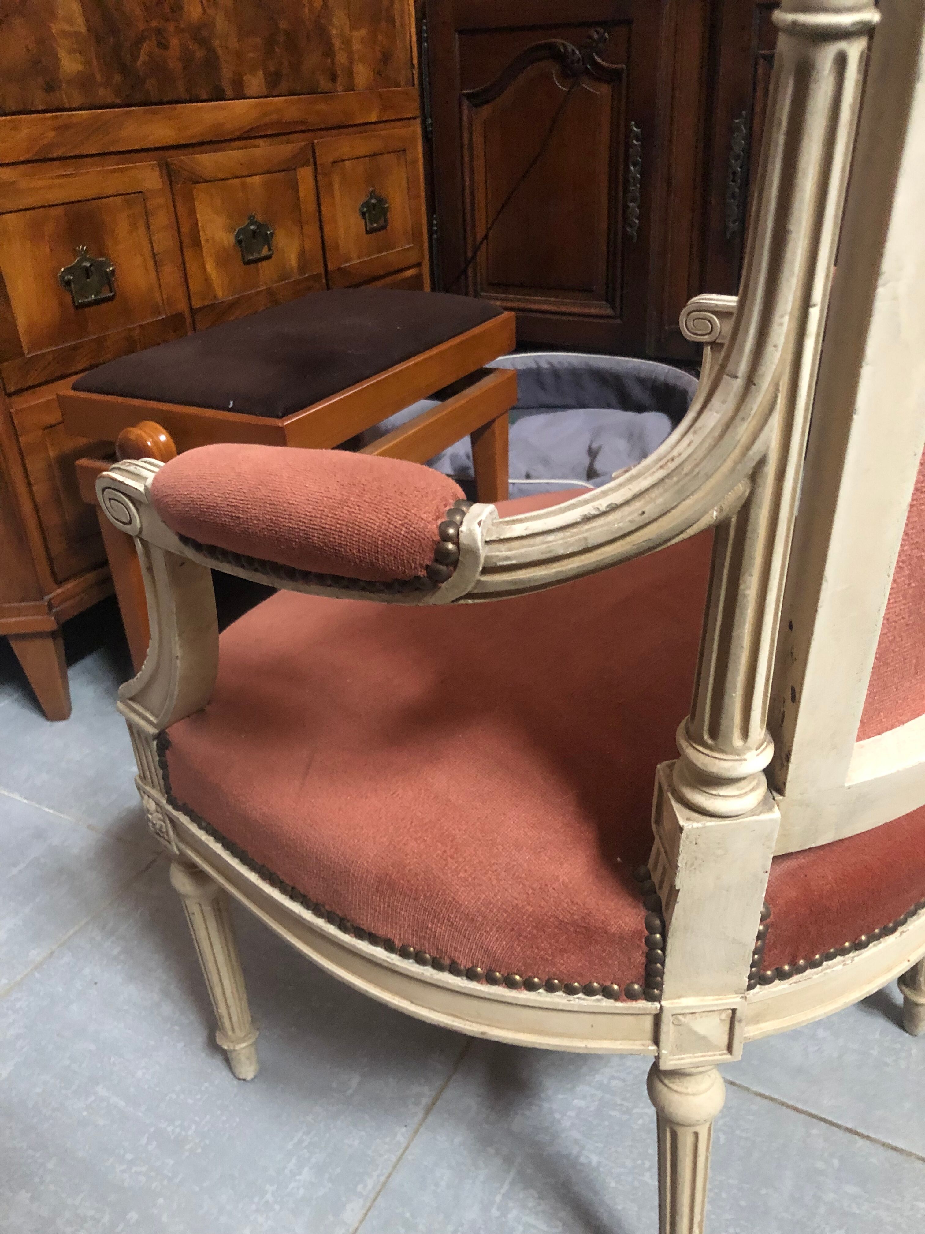 Patinated armchair in Louis XVI style