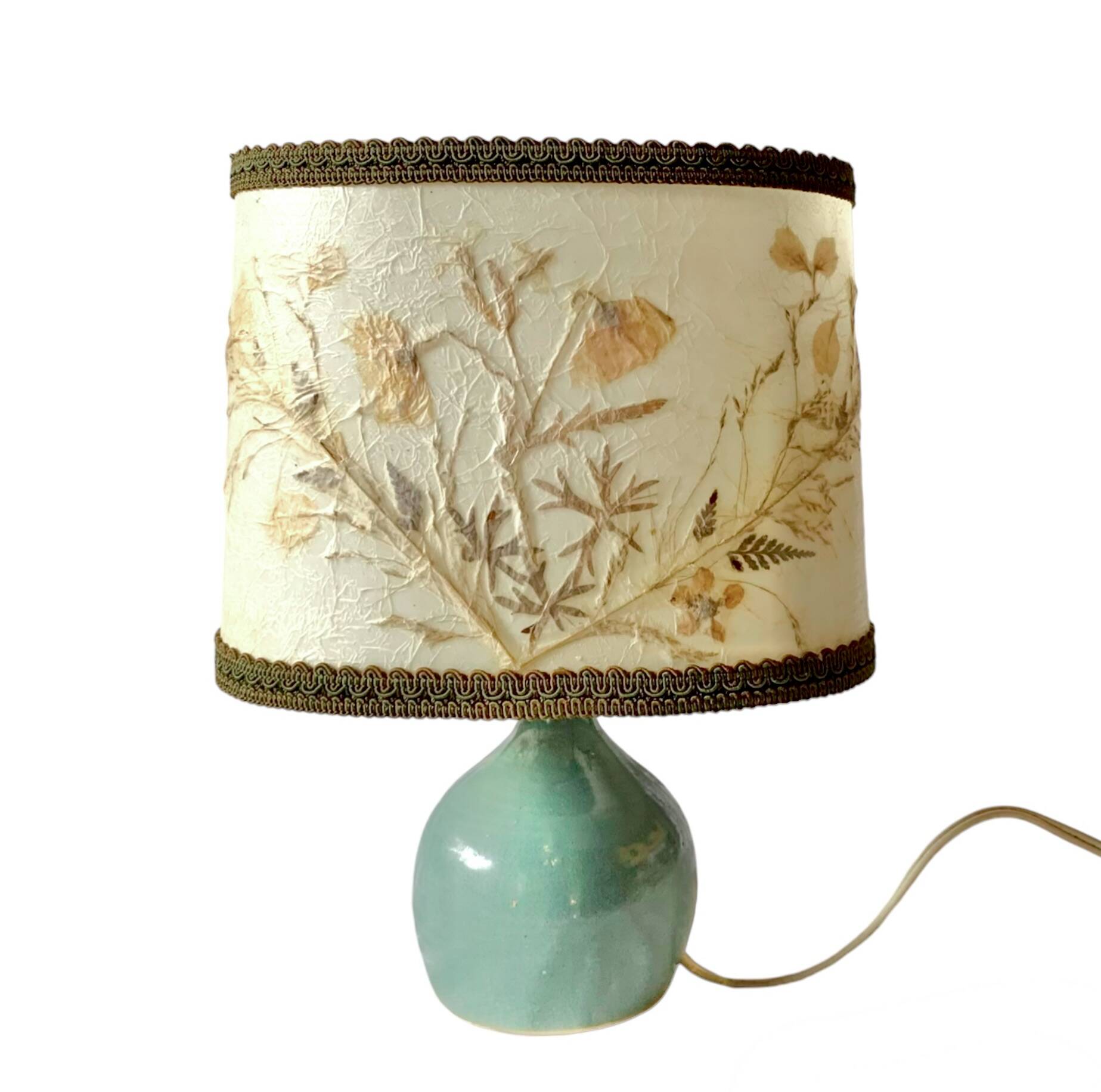 Old small green ceramic side lamp with dried flower lampshade