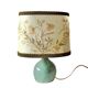 Old small green ceramic side lamp with dried flower lampshade