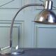Articulated desk lamp in chrome metal, circa 1960.