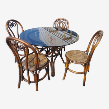 Rattan dining table and its 4 matching chairs