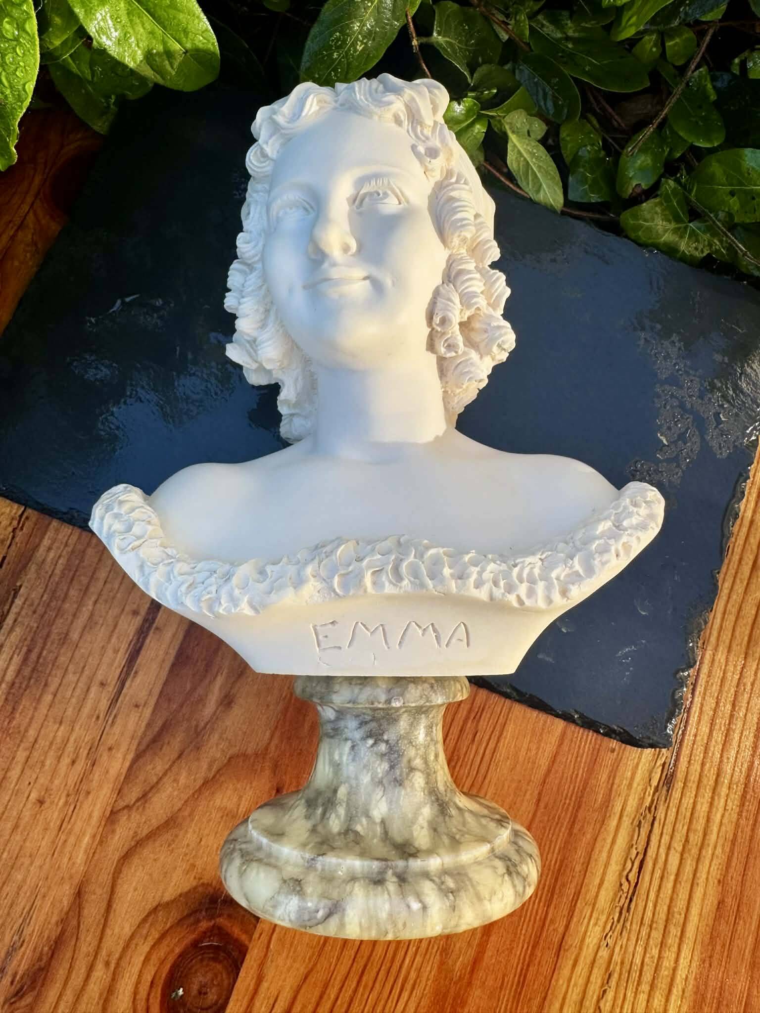 Bust of a woman signed Arnaldo Giannelli dated 1972.