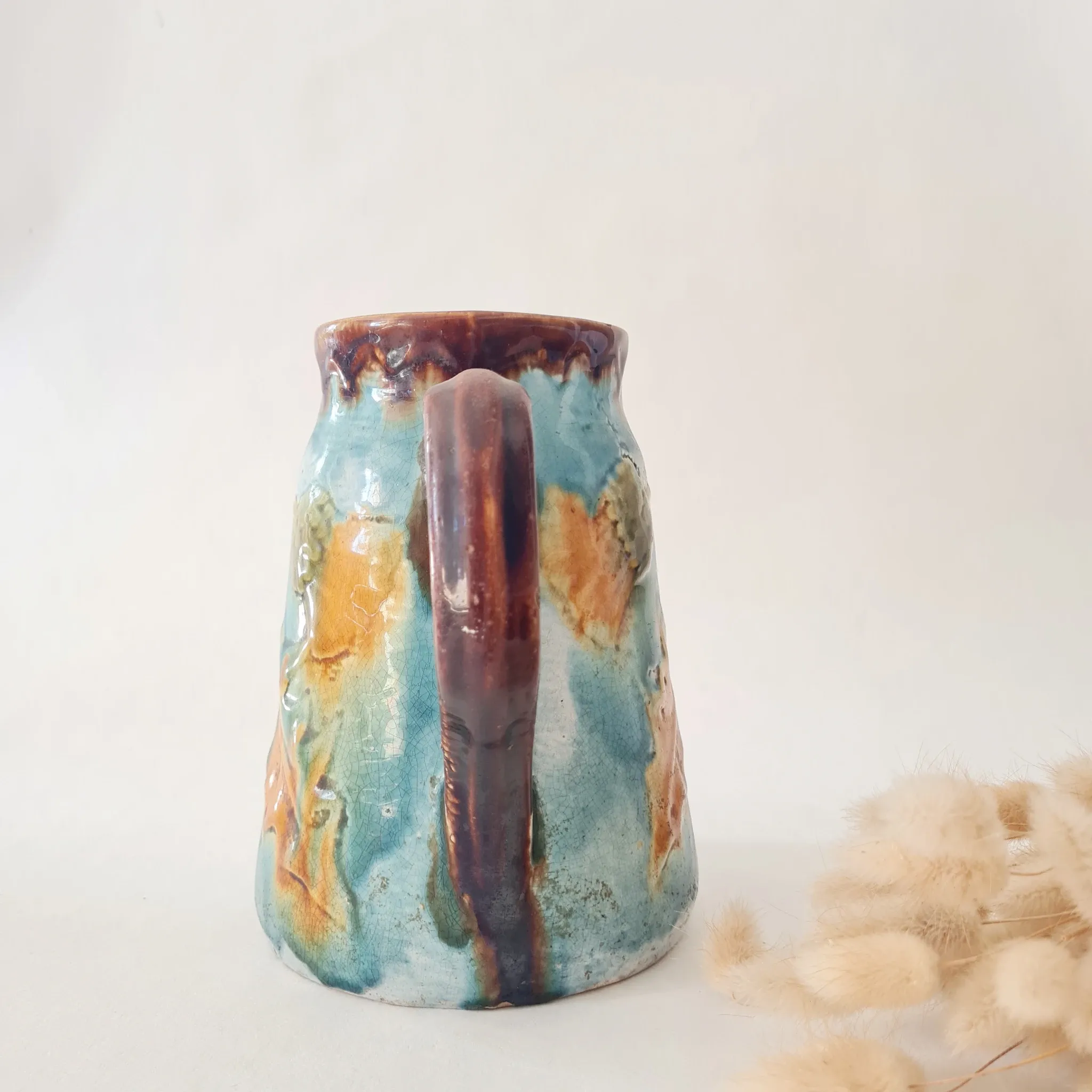 Old glazed stoneware pitcher - autumn