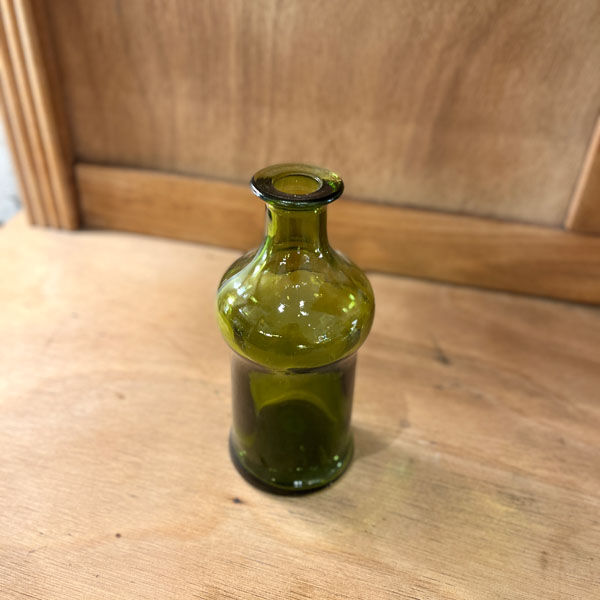 Green glass bottle or vial