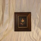 Portrait painting with wooden frame and gilding