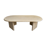 Oval coffee table in travertine