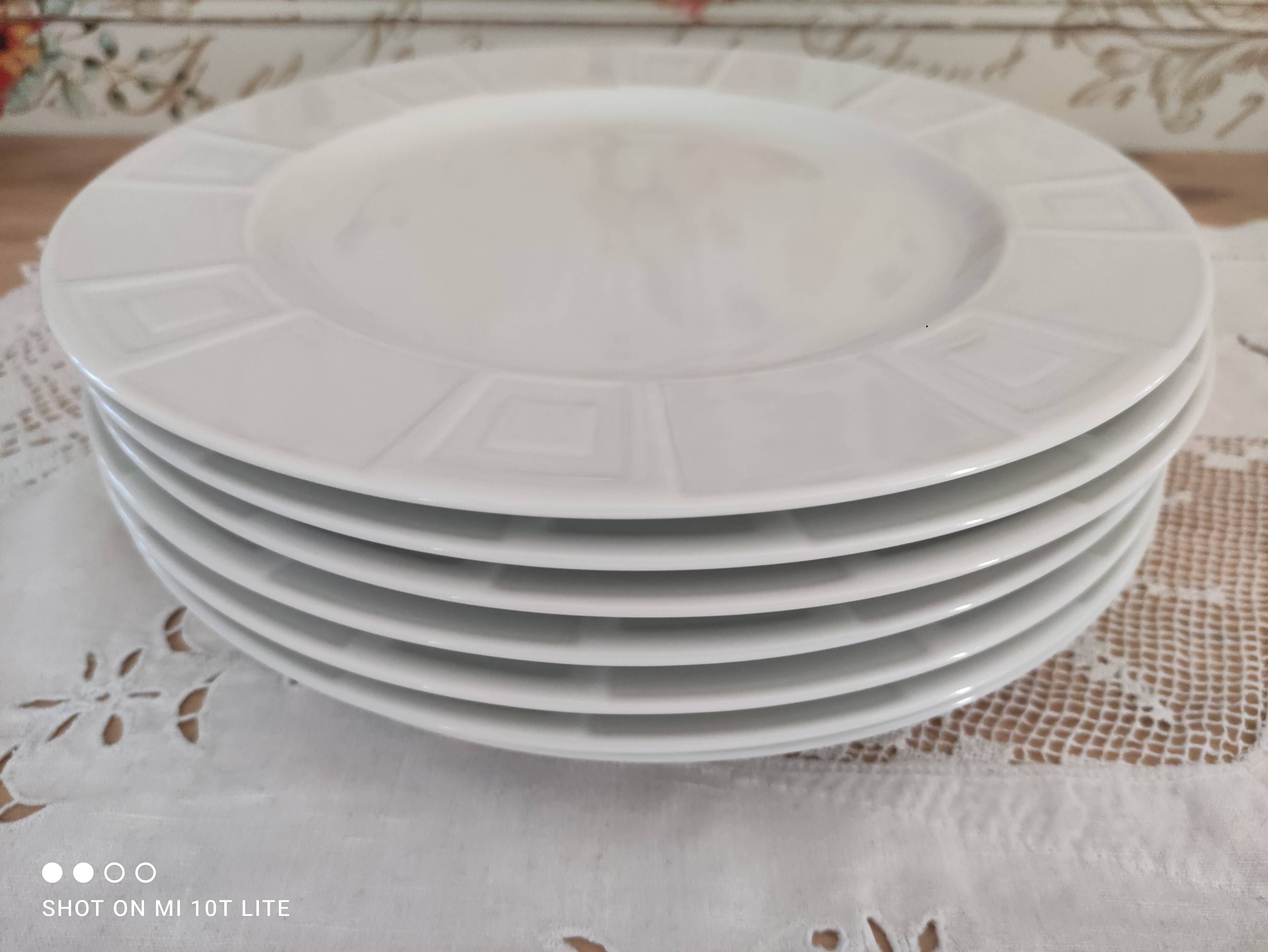 Set of 7 flat plates in white Limoges porcelain geometric decoration in relief