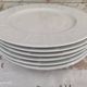 Set of 7 flat plates in white Limoges porcelain geometric decoration in relief