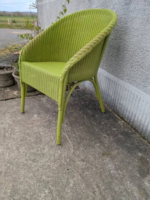 Lime green wicker armchair