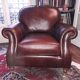Napoleon III style leather armchair pair