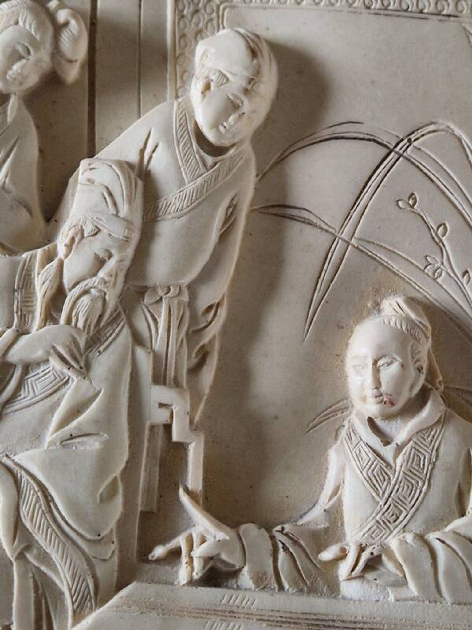 Sculpted resin plaque in the style of China.