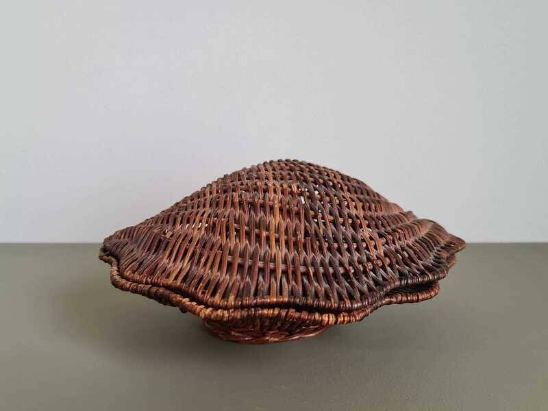 Vintage wicker shell basket, French bohemian decoration.